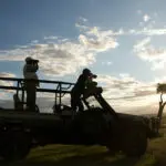 Game drive vehicles have open tops & sides: everyone gets a view when on safari.