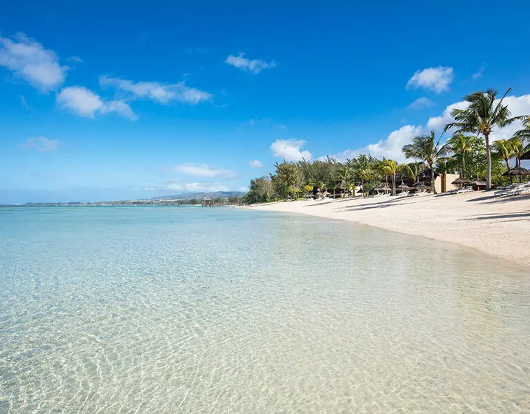 White sandy beaches and azure waters await you at Shanti Maurice.