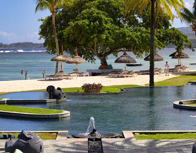 Enjoy the pool or beach at Shanti Maurice.