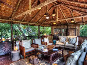 The main lodge has a relaxed lounge where you can catch up with your companions, read a book or enjoy a refreshing G&T.
