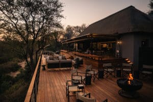 simbambili-main-lodge-deck-at-sunset