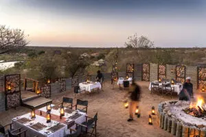 A lantern-lit boma dinner awaits!