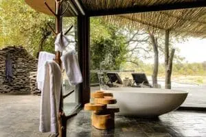 Bush suite bathroom at Singita Boulders Lodge.