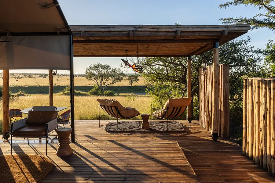 singita-mara-river-tented-camp-_tent_deck_emma_jackson-1-scaled