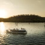 Cruceros de ensueño al atardecer por el lago Malilangwe con Singita