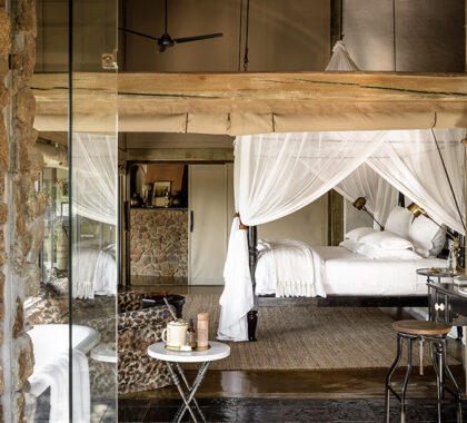 Netted beds for a peaceful sleep at Singita Ebony Lodge.