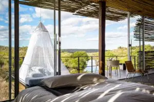 La lujosa cama en el cielo del Singita Lebombo Lodge.