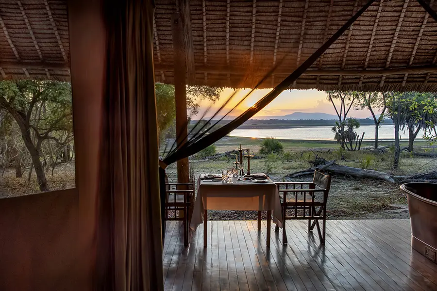 Private dinner set-up in tented suite with view over Lake Nzerakera.
