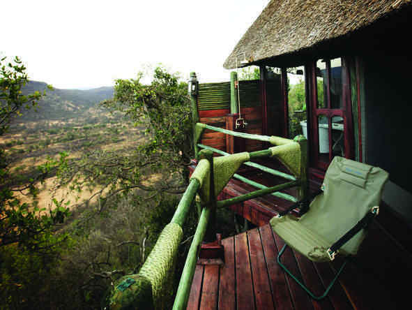 Catch the early morning sunshine on your private balcony overlooking the Serengeti.