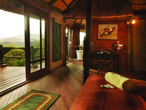 Your elegantly furnished bedroom opens onto a private balcony overlooking the vast Serengeti plains.