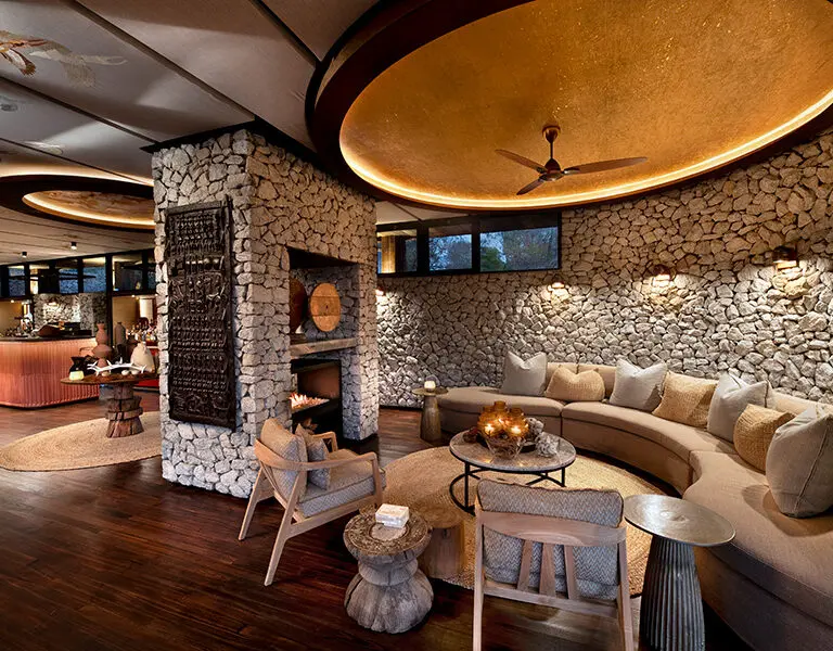 A warm and welcoming main guest area includes a cosy fireplace.