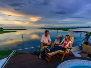 Take in the exceptional views of Lake Kariba as dusk settles over the water.
