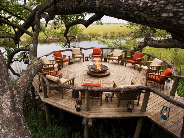 Swop safari stories around the campfire at Xakanaxa Camp, set in a game-rich area of the Moremi Game Reserve.