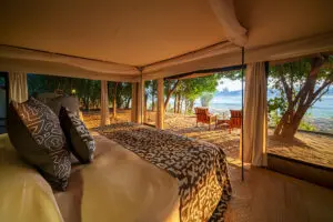 Expect comfortable beds and a tent decorated in typical safari flair.