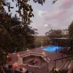 The lower deck has a cosy firepit and a plunge pool. 
