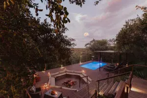 The lower deck has a cosy firepit and a plunge pool. 