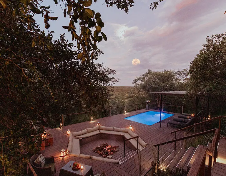 The lower deck has a cosy firepit and a plunge pool. 