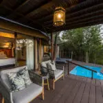 The tented suites have a private deck with a plunge pool and seating.