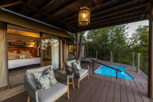 The tented suites have a private deck with a plunge pool and seating.