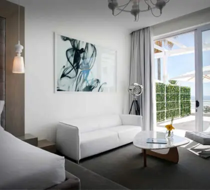 Sea-facing suites have uninterrupted views of Camps Bay beach from their balconies.