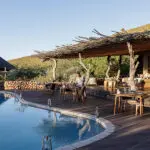 Lunch set up on the pool deck | The Motse at Tswalu. 