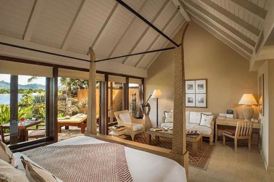 Luxury Pavilion room interior at The Oberoi Beach Resort.