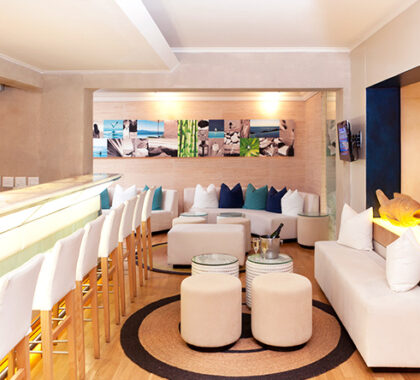 The stylish bar at The Plettenberg is trendy and modern, with many inviting places to relax and enjoy a drink or two.
