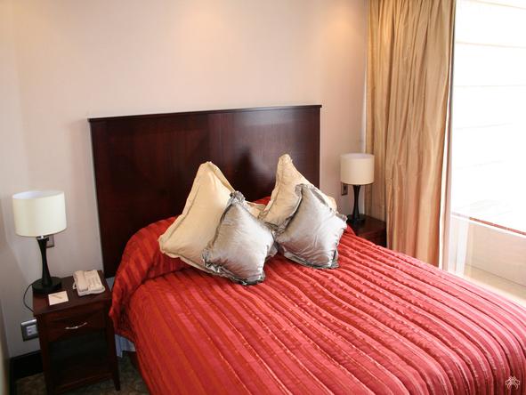 Sink deep into your comfortable bed and enjoy your stay in a classically decorated suite.