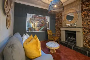 The fireplace and lounge in a Luxury Suite.