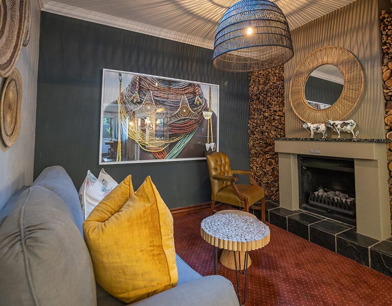 The fireplace and lounge in a Luxury Suite.