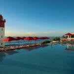 One of South Africa's coastal landmarks, The Oyster Box has amazing views of the ocean and lighthouse.