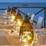 Candlelight replaces sunlight as the sun goes down, creating a wonderfully romantic ambience.
