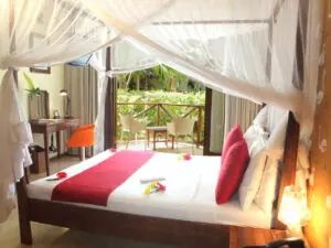 Complete with air conditioning, the Deluxe Garden View Rooms open out onto a balcony or terrace.
