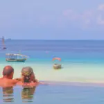 The hotel's infinity pool makes a great place to observe the comings & goings in the water below you.
