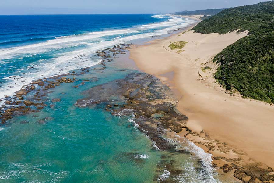 Rock pools and beach.