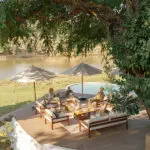 Main deck and swimming pool at Chongwe house.