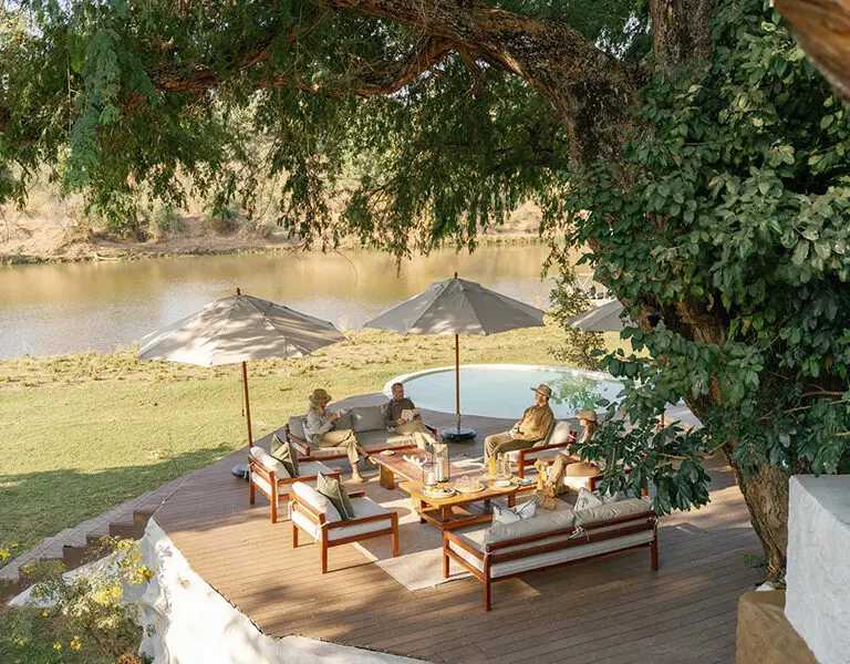 Main deck and swimming pool at Chongwe house.