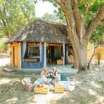 Enjoy a private picnic setup in front of your luxury tent, enjoying the view and complete privacy.