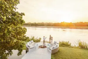 Enjoy a sundowner by a crackling fire.