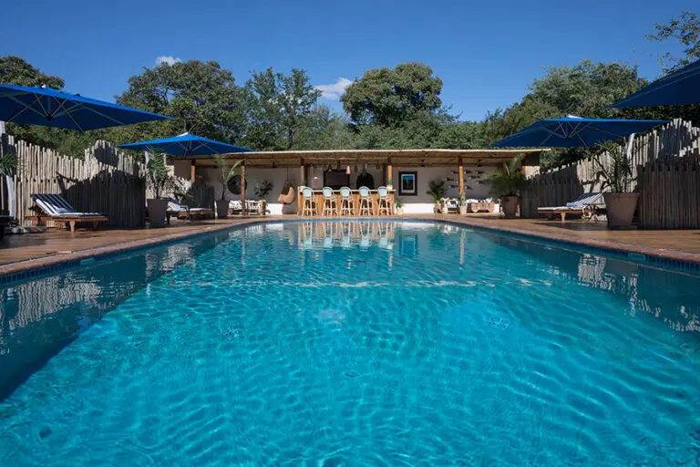 Cool off during the heat of the day in Tongabezi's large pool.