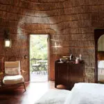 Traditional red and bamboo roof and walls add to the authentic feel of Zulu Camp.
