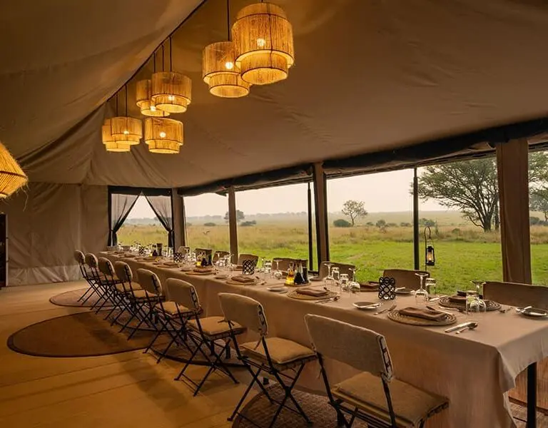 The dining tent set up for dinner.