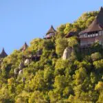 Rooms are like luxurious tree-houses tucked into a hill and connected by rope bridges.
