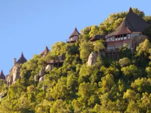 Rooms are like luxurious tree-houses tucked into a hill and connected by rope bridges.
