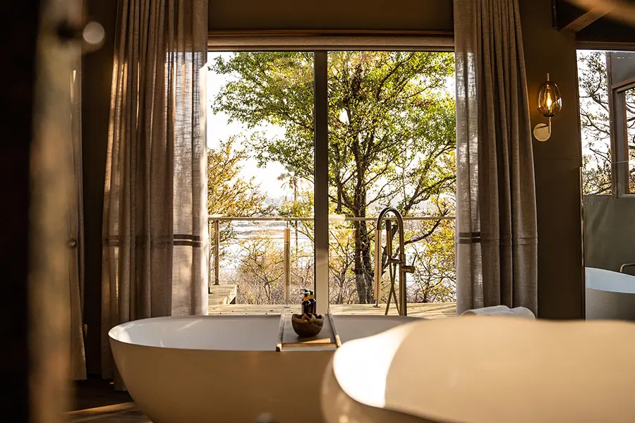 victoria-falls-river-lodge-_superior-family-tent-view-bath