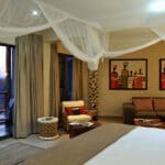 Beds are gracefully draped with huge walk-in mosquito nets.