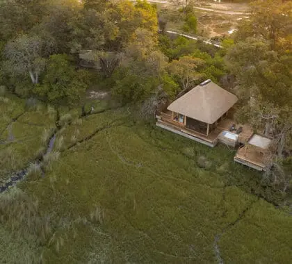Vumbura Plains aerial view of a tented suite, in the Okavango Delta, bordering the Moremi Game Reserve.