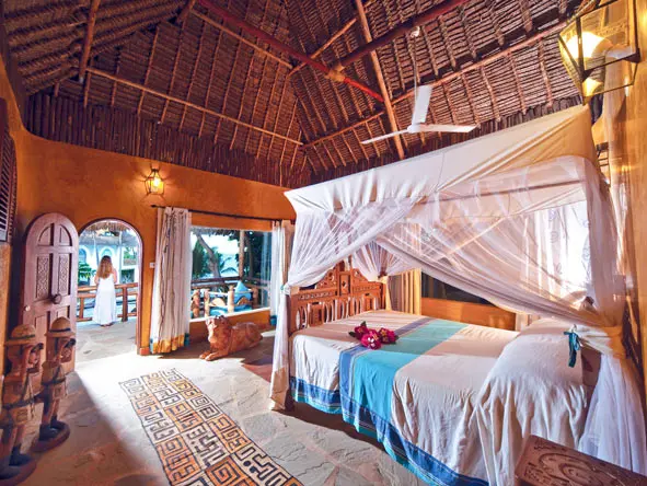 Ceiling fans & draped mosquito nets ensure a good night's sleep.
