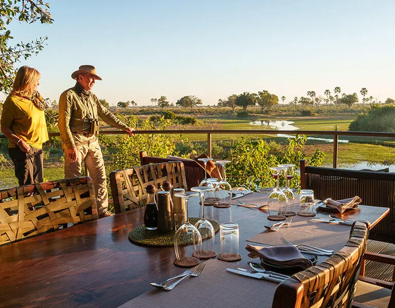 Dine with a view, serenaded by hippos wallowing out in the water. 