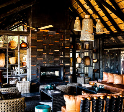A  a thatch-covered bar and dining area whose aesthetics are in complete harmony with the natural environment.